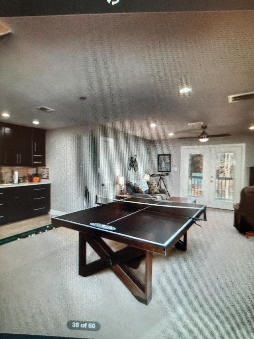Finished recreation room with wet bar