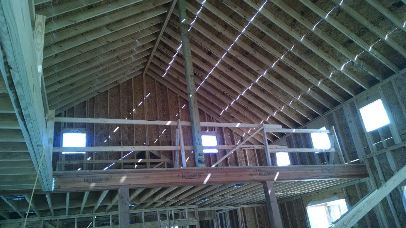 Vaulted framing and loft structure under construction