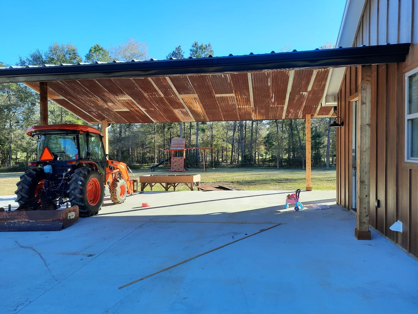 Covered patio addition with timber posts
