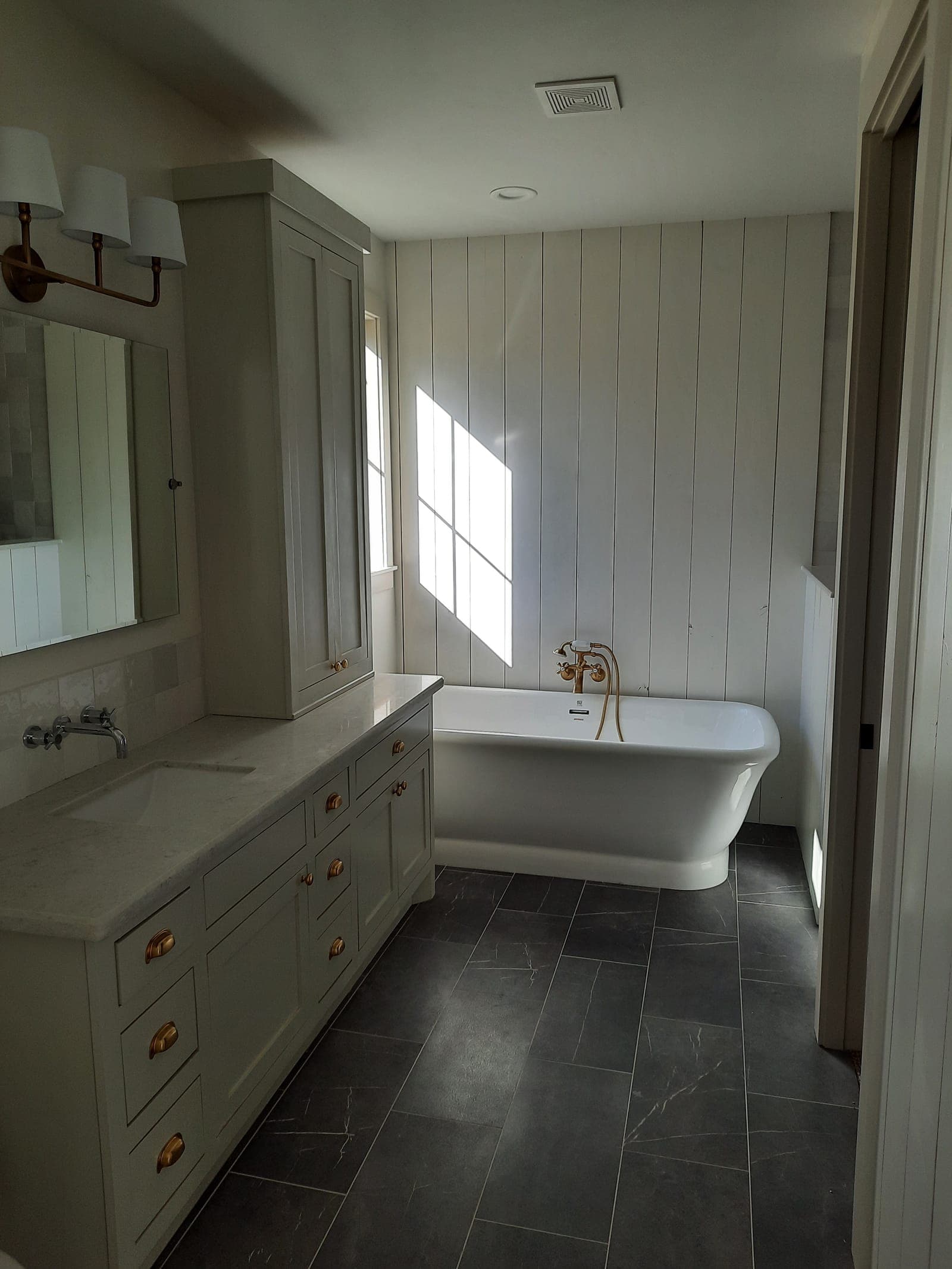 Freestanding tub and custom vanity bath