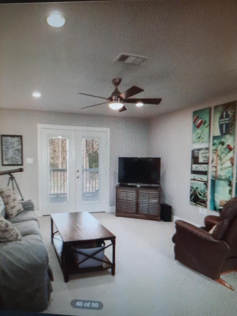 Living room with French doors to deck