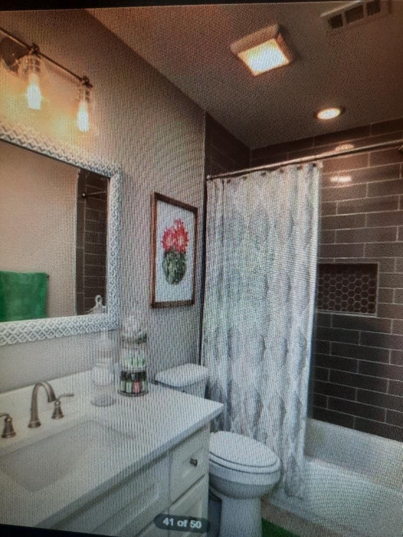 Modern bathroom remodel with subway tile shower